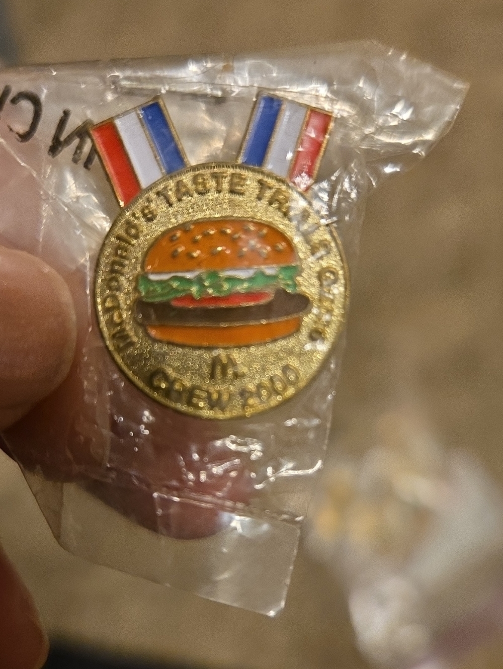 McDonald's Gold Burger Medal Pin with Red, White & Blue Ribbon